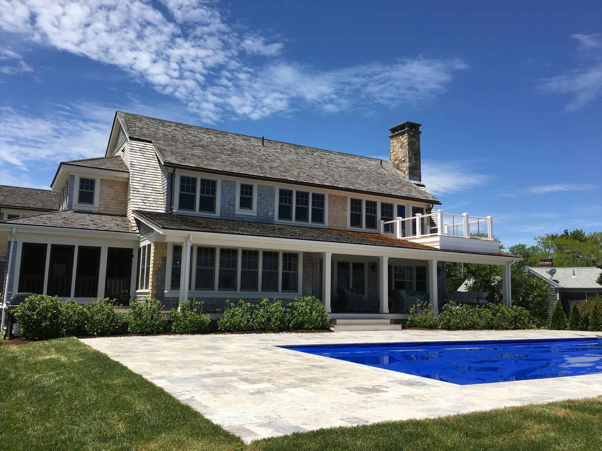 BelPort Building & Remodeling exterior whole home remodel with pool and patio Barnstable MA