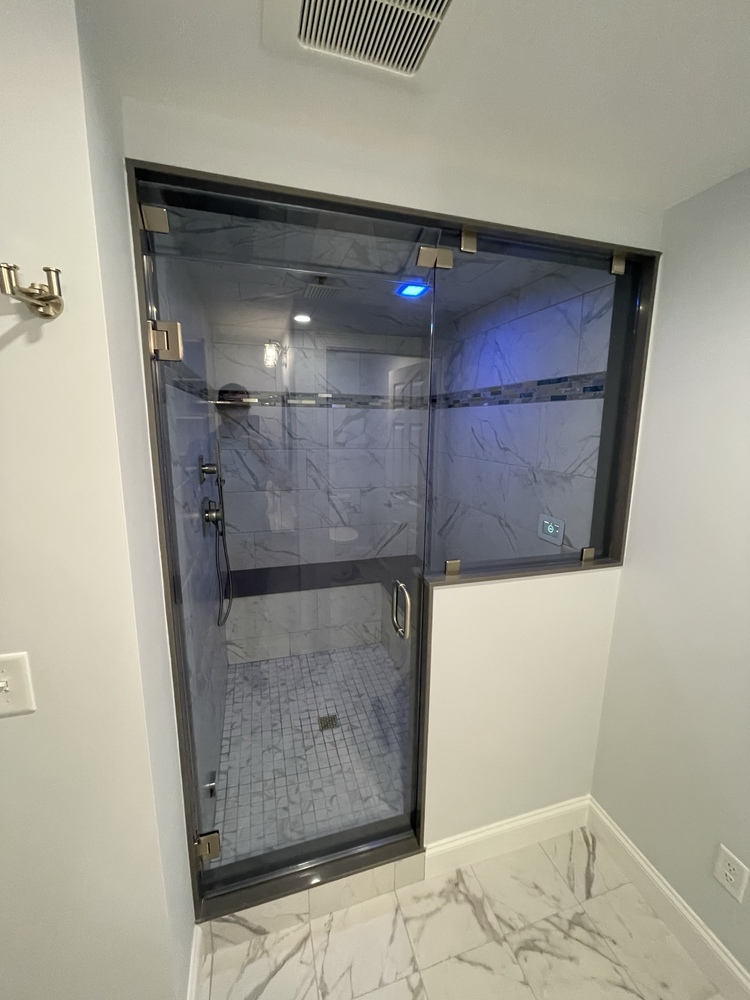 BelPort Building & Remodeling basement remodeling Hyannis MA finished basement shower with glass enclosure and tile walls