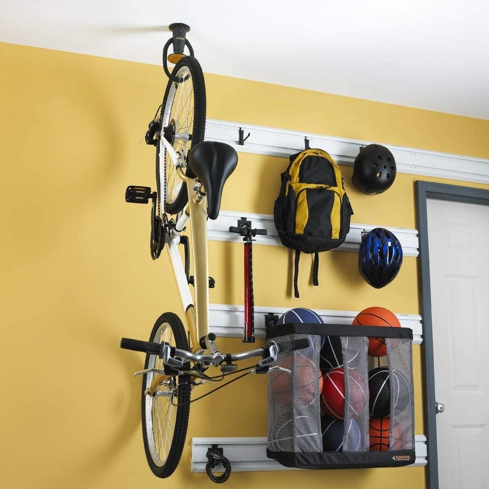 garage wall organization system with hanging bike and storage bins in Barnstable by BelPort Building & Remodeling