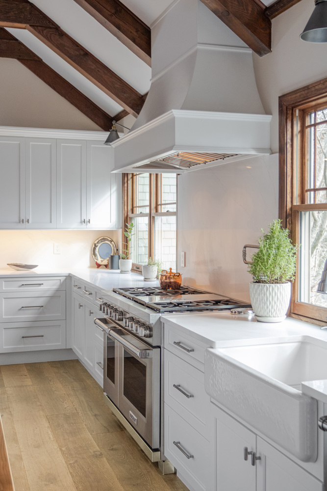 detailed cooking area with custom cabinetry in Forestdale MA kitchen remodel by BelPort Building & Remodeling